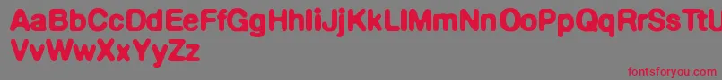 Defontedemigras Font – Red Fonts on Gray Background