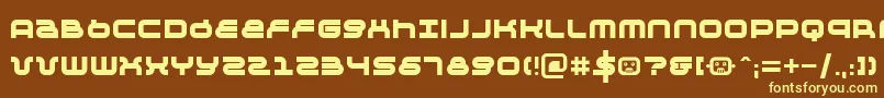 Negtiv24-fontti – keltaiset fontit ruskealla taustalla
