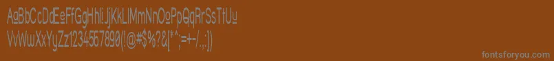 Czcionka StreetCornerUpperNarrower – szare czcionki na brązowym tle