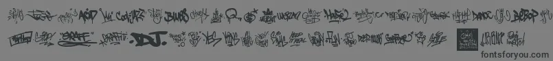 GraffitiTags-Schriftart – Schwarze Schriften auf grauem Hintergrund