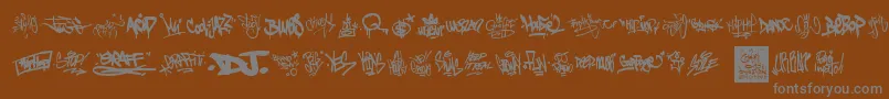 GraffitiTags Font – Gray Fonts on Brown Background