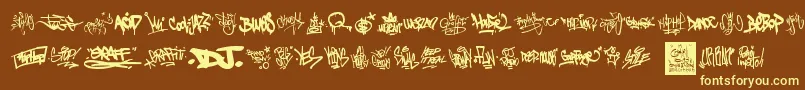 GraffitiTags Font – Yellow Fonts on Brown Background