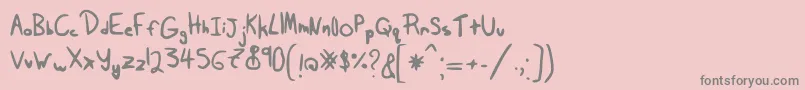 フォントTairak.Smessynezz – ピンクの背景に灰色の文字