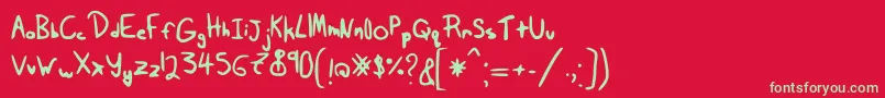 Tairak.Smessynezz-Schriftart – Grüne Schriften auf rotem Hintergrund