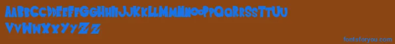 SaiyanSansregular Font – Blue Fonts on Brown Background