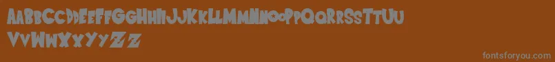 SaiyanSansregular Font – Gray Fonts on Brown Background