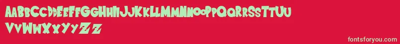 SaiyanSansregular Font – Green Fonts on Red Background