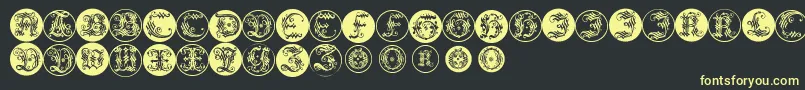 Ornamentalinitialbuttons Font – Yellow Fonts on Black Background
