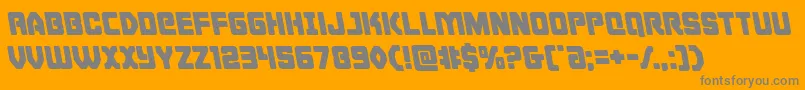 Cyborgroosterleft-fontti – harmaat kirjasimet oranssilla taustalla