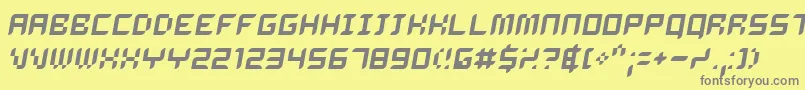 Delio-fontti – harmaat kirjasimet keltaisella taustalla