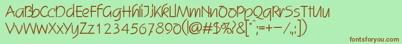 SkizzedbNormal Font – Brown Fonts on Green Background