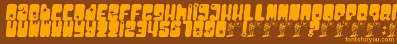 フォントMoonpcgs – オレンジ色の文字が茶色の背景にあります。
