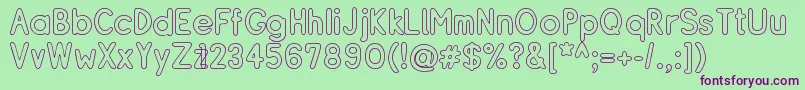 Resibo Font – Purple Fonts on Green Background