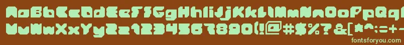 Stranger-Schriftart – Grüne Schriften auf braunem Hintergrund