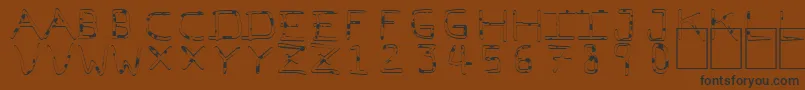 PfVeryverybadfont7Liquid-fontti – mustat fontit ruskealla taustalla