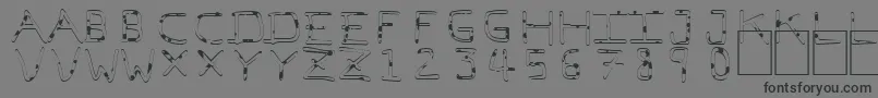 Шрифт PfVeryverybadfont7Liquid – чёрные шрифты на сером фоне