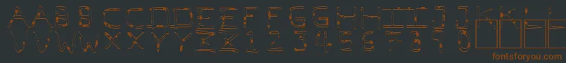 Шрифт PfVeryverybadfont7Liquid – коричневые шрифты на чёрном фоне