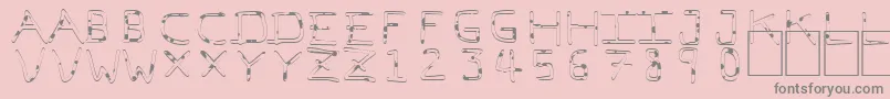 PfVeryverybadfont7Liquid-fontti – harmaat kirjasimet vaaleanpunaisella taustalla
