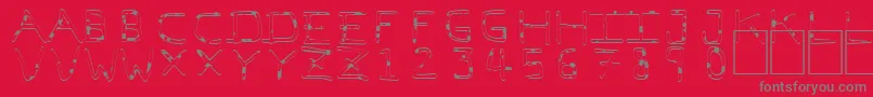PfVeryverybadfont7Liquid-fontti – harmaat kirjasimet punaisella taustalla