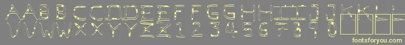 PfVeryverybadfont7Liquid-Schriftart – Gelbe Schriften auf grauem Hintergrund