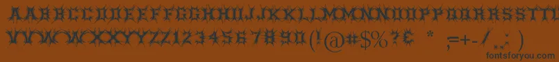 Threatened Font – Black Fonts on Brown Background