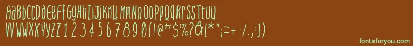 フォントSteepquickhand – 緑色の文字が茶色の背景にあります。