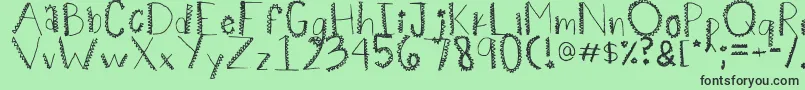 Spiiikey Font – Black Fonts on Green Background