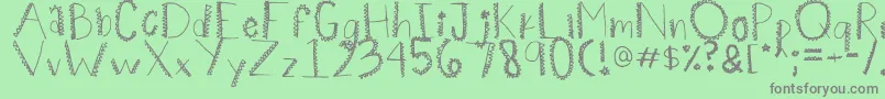Spiiikey Font – Gray Fonts on Green Background