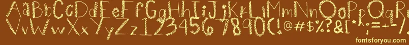 Spiiikey Font – Yellow Fonts on Brown Background