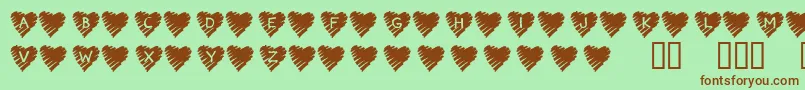 Шрифт KrScribbleHeart – коричневые шрифты на зелёном фоне