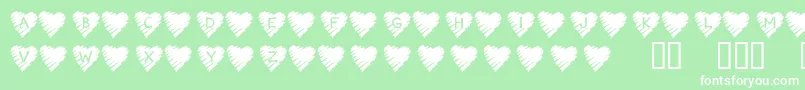 Шрифт KrScribbleHeart – белые шрифты на зелёном фоне
