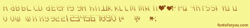 Naujokslove Font – Brown Fonts on Yellow Background