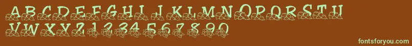 フォントLmsLindalicious – 緑色の文字が茶色の背景にあります。
