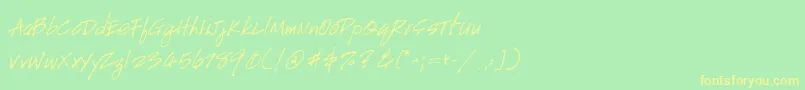 フォントGeHandyscript – 黄色の文字が緑の背景にあります