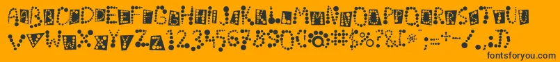 Linotypekropki-fontti – mustat fontit oranssilla taustalla