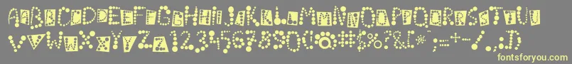 フォントLinotypekropki – 黄色のフォント、灰色の背景