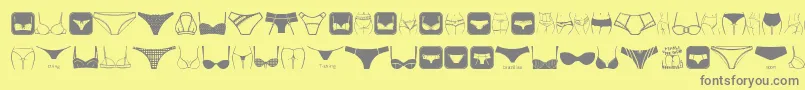 FemaleUnderwear-fontti – harmaat kirjasimet keltaisella taustalla