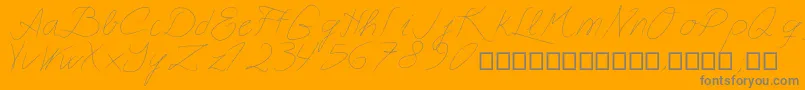 Czcionka Astralasia – szare czcionki na pomarańczowym tle