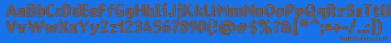 フォントRingmatrix3D – 茶色の文字が青い背景にあります。
