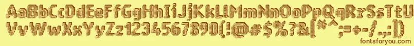フォントRingmatrix3D – 茶色の文字が黄色の背景にあります。