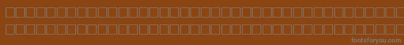 TolandRegular Font – Gray Fonts on Brown Background