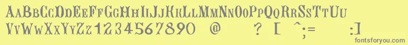 BujardetFreresUnregistered Font – Gray Fonts on Yellow Background