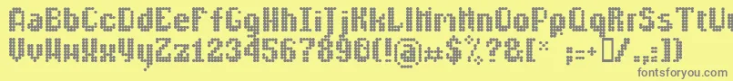 Lldisco-fontti – harmaat kirjasimet keltaisella taustalla