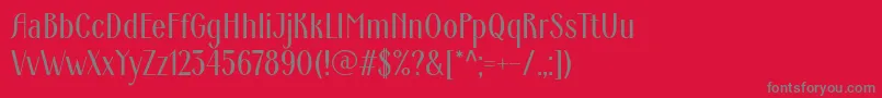 Czcionka ArdecoWebfont – szare czcionki na czerwonym tle