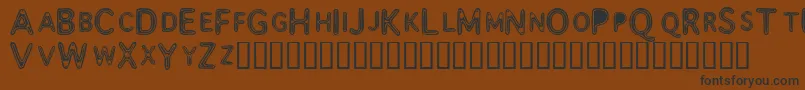 Assimila Font – Black Fonts on Brown Background