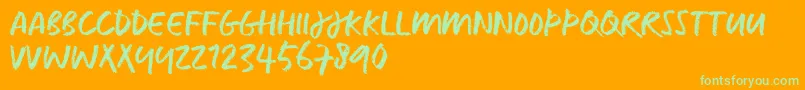 CaputTrial-Schriftart – Grüne Schriften auf orangefarbenem Hintergrund