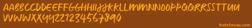 CaputTrial-Schriftart – Orangefarbene Schriften auf braunem Hintergrund