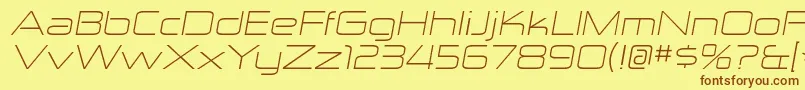 ZektonexltItalic-Schriftart – Braune Schriften auf gelbem Hintergrund