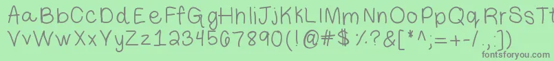 フォントLibbyhand – 緑の背景に灰色の文字