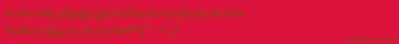 NeueRudelskopfVerbundenSchraegFett-Schriftart – Braune Schriften auf rotem Hintergrund